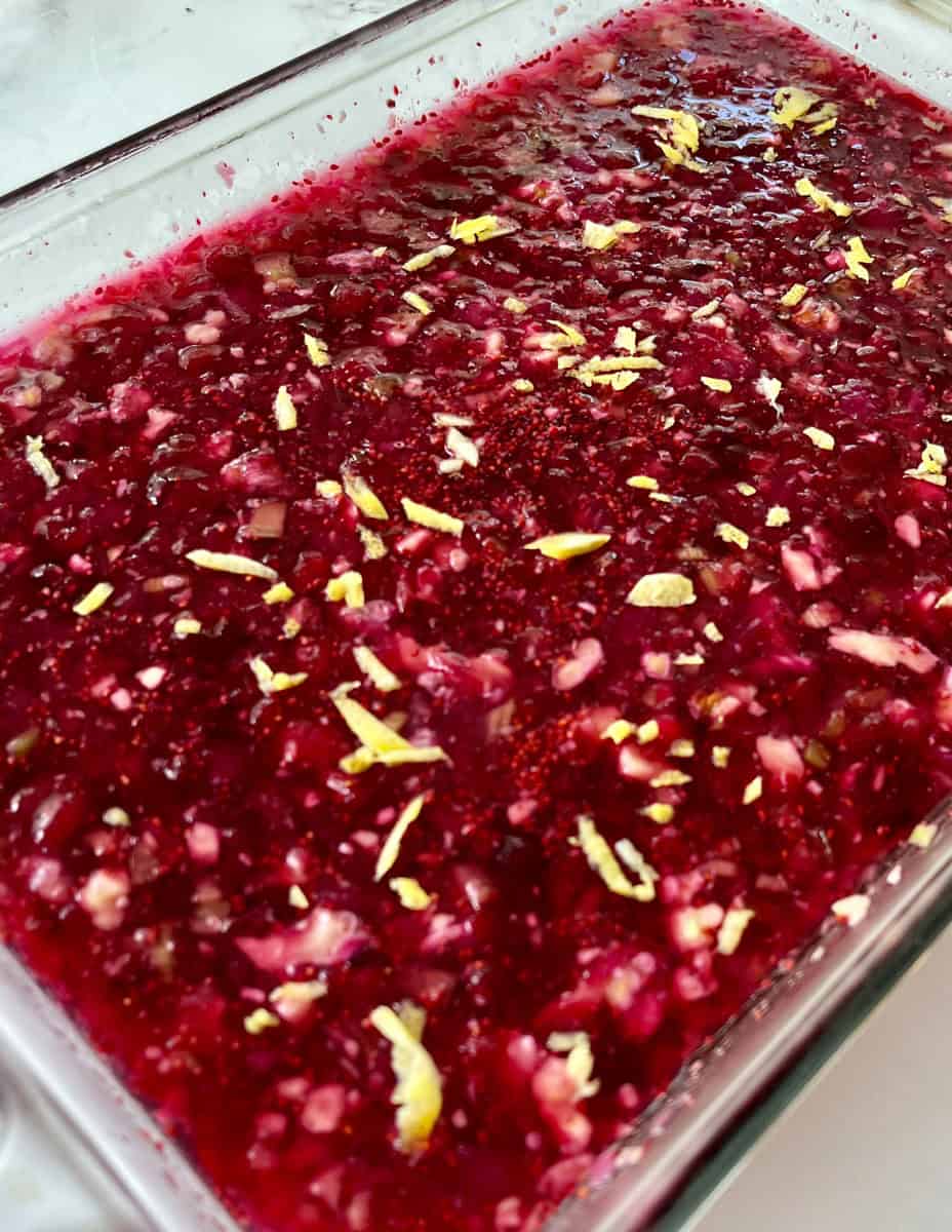 Clear glass rectangular dish with a jello salad in it
