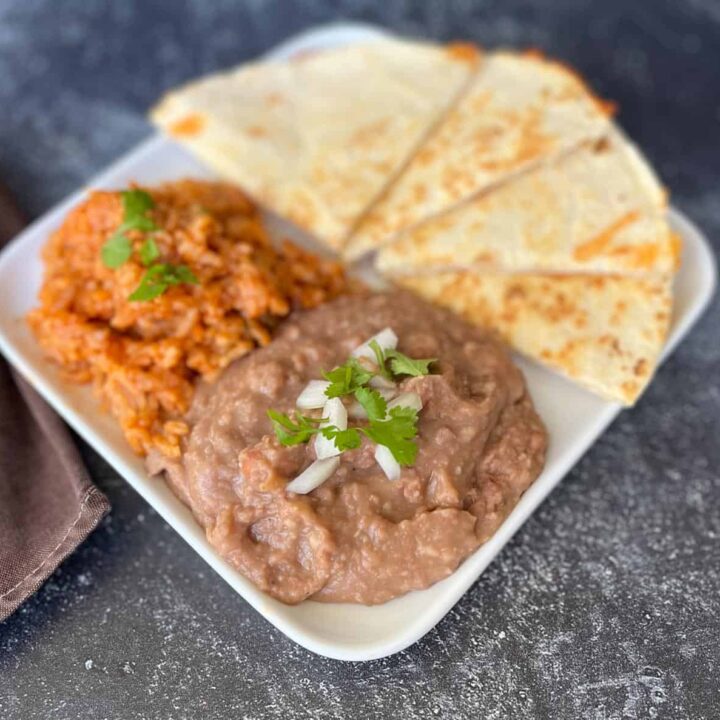 Mexican rich with tortillas and refried beans.