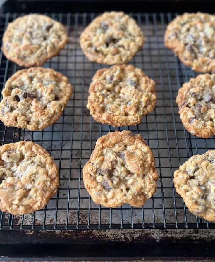 Oatmeal cookies on a cooling rack.