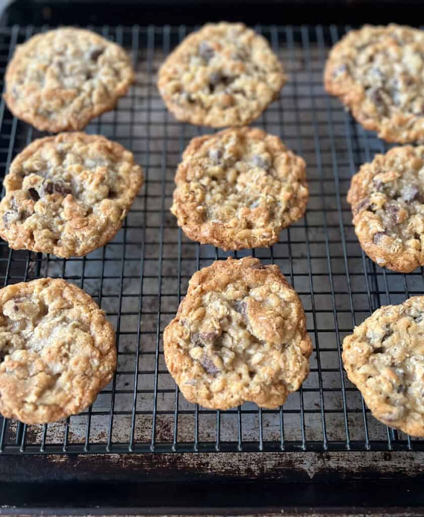 Oatmeal cookies on a cooling rack.
