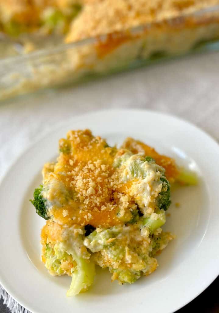 Broccoli casserole with cheese and cracker crumbs.