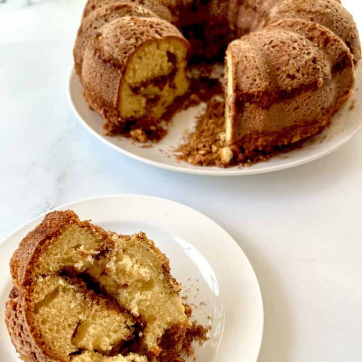 A bundt cake with a slice taken out of it.