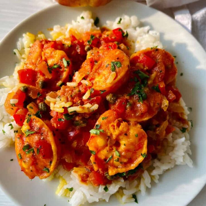 Shrimp and tomato sauce on rice.