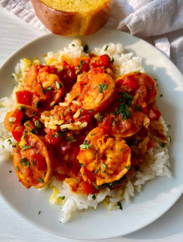Shrimp and tomato sauce on rice.