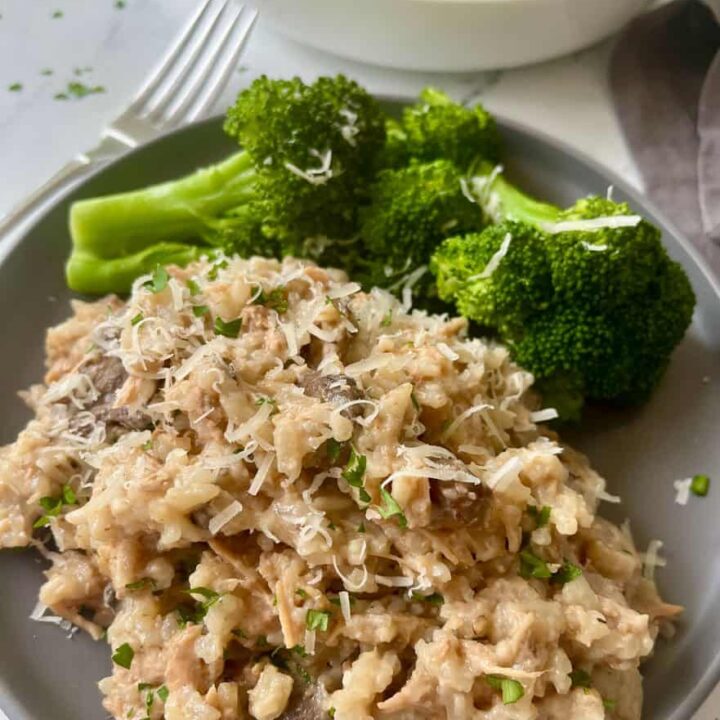 Slow cooker pork chops with mushroom soup and rice with a side of broccoli.