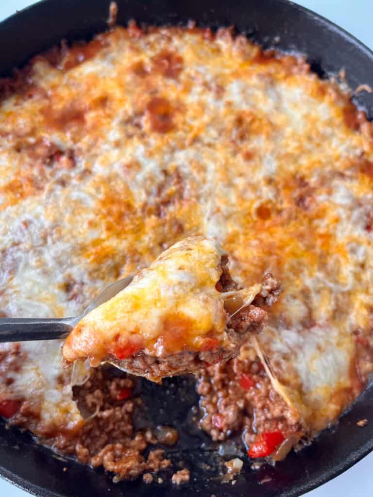 Sloppy Joe Casserole in a cast iron skillet.