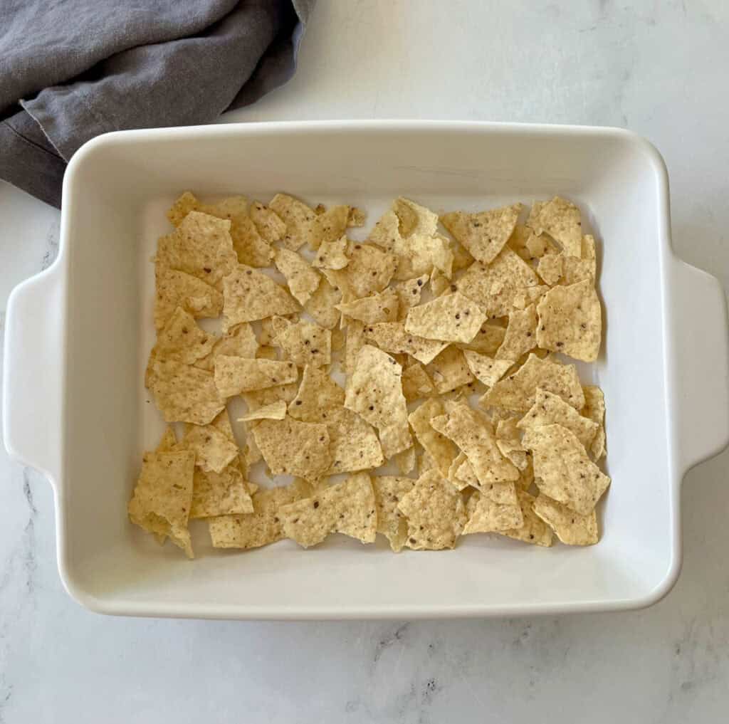 Tortilla chips in a baking dish.