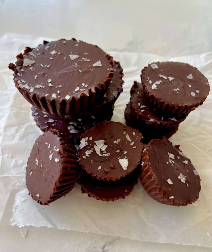 Chocolate peanut butter cups with sea salt on top.