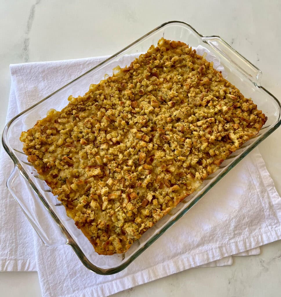 Chicken stuffing casserole in a glass baking dish.