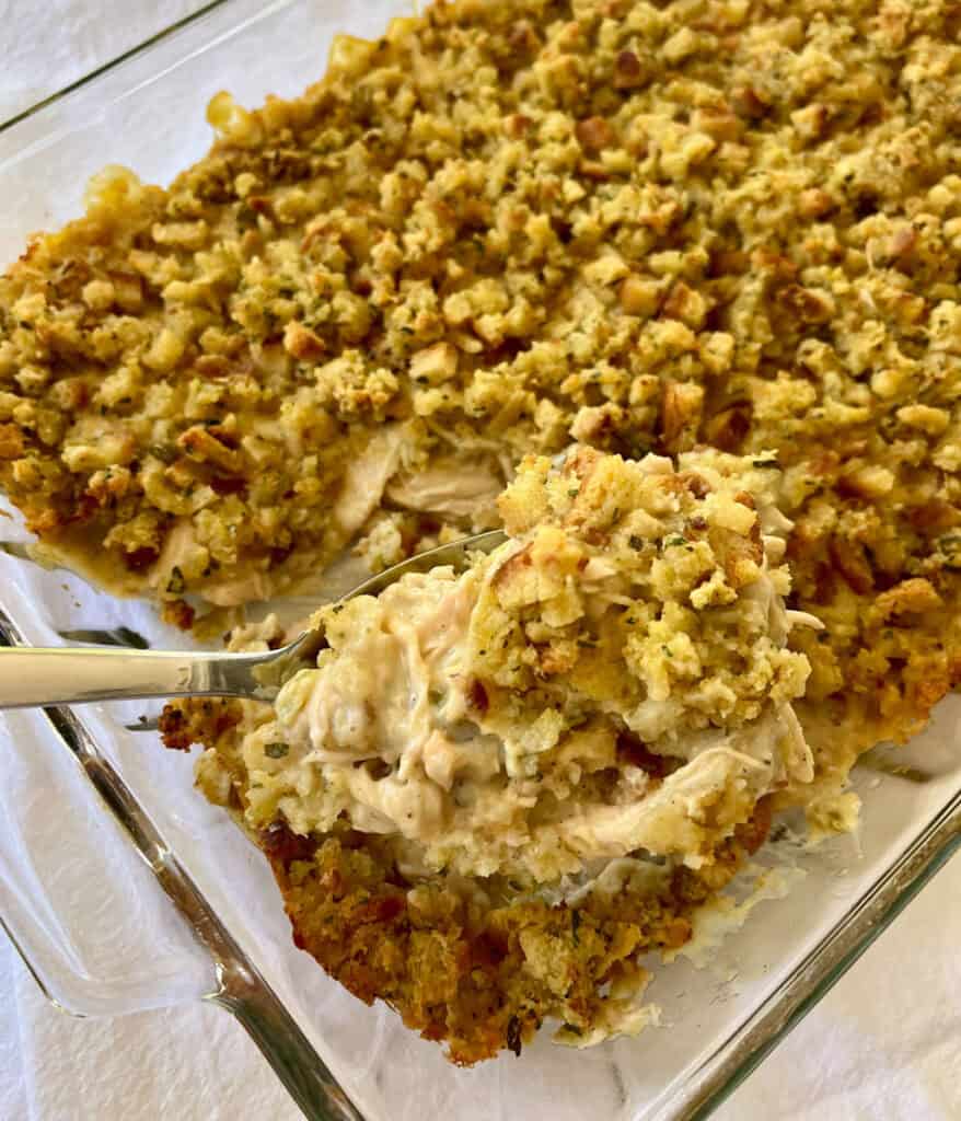 Chicken stuffing casserole in a glass baking dish.