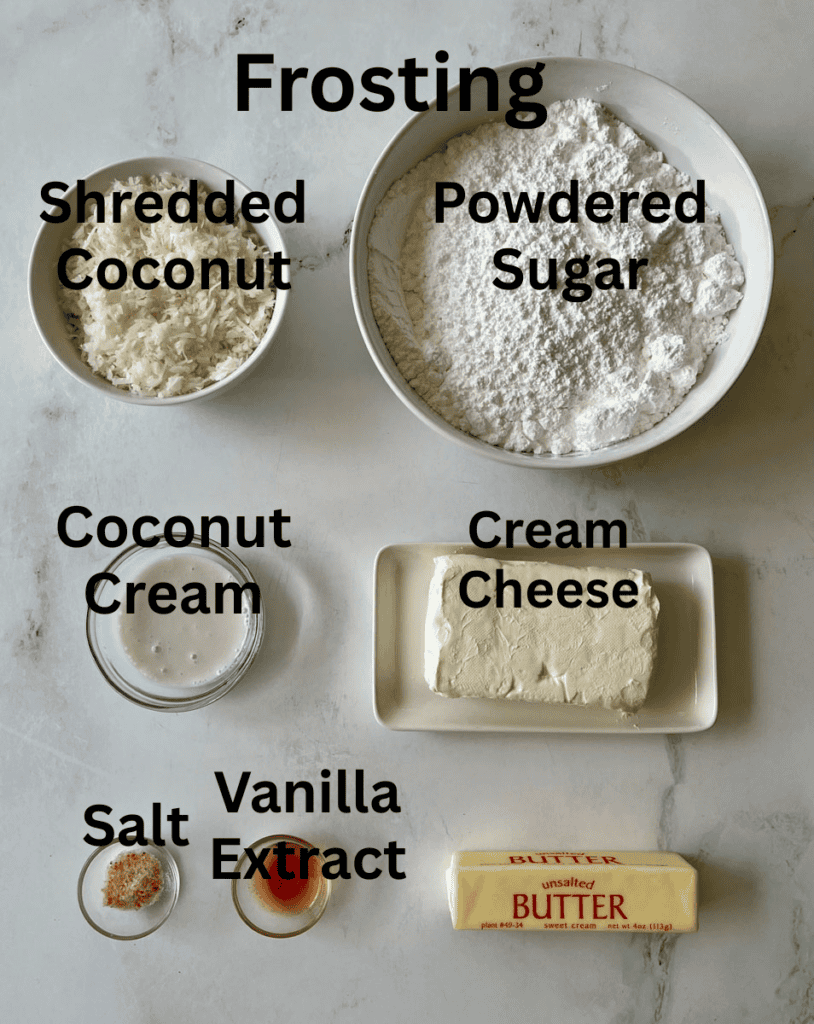 Frosting ingredients including shredded coconut, powdered sugar, coconut cream, cream cheese.