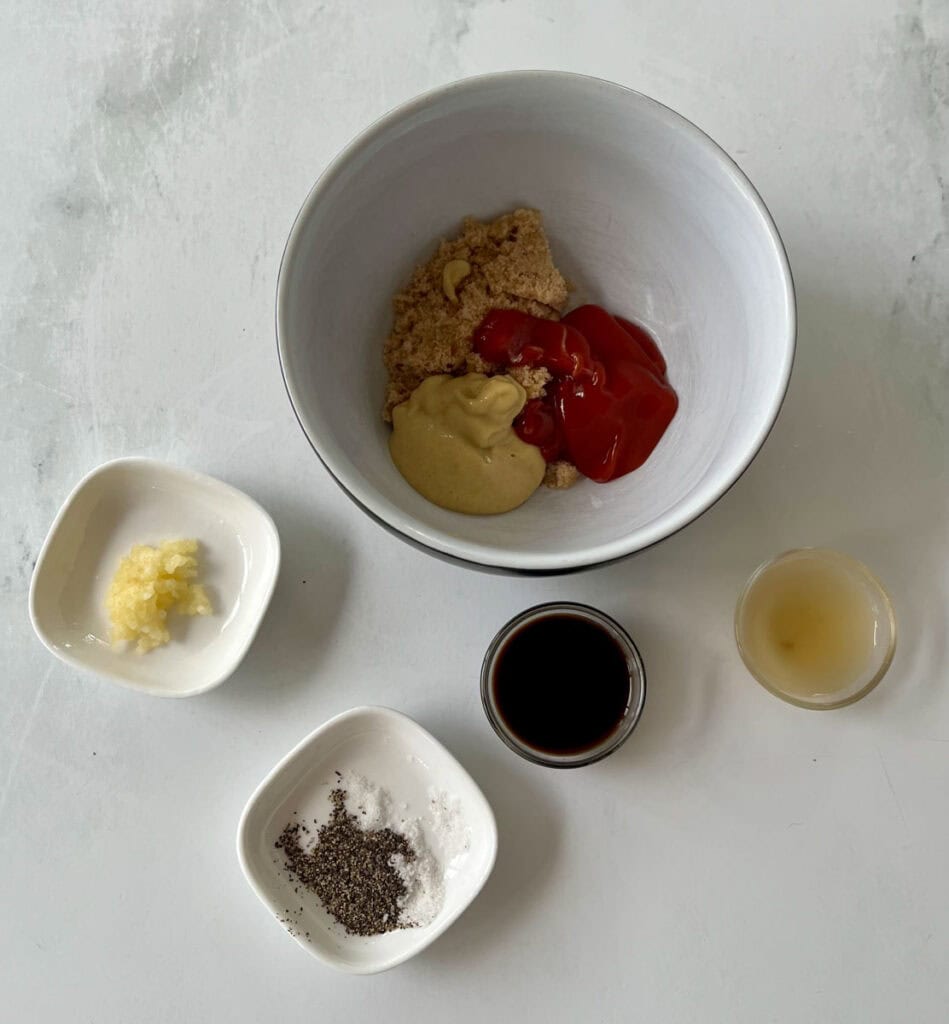 Assorted cooking ingredients including ketchup, mustard, soy sauce, vinegar, and seasonings.